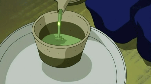 a gif of someone pouring a cup of green tea